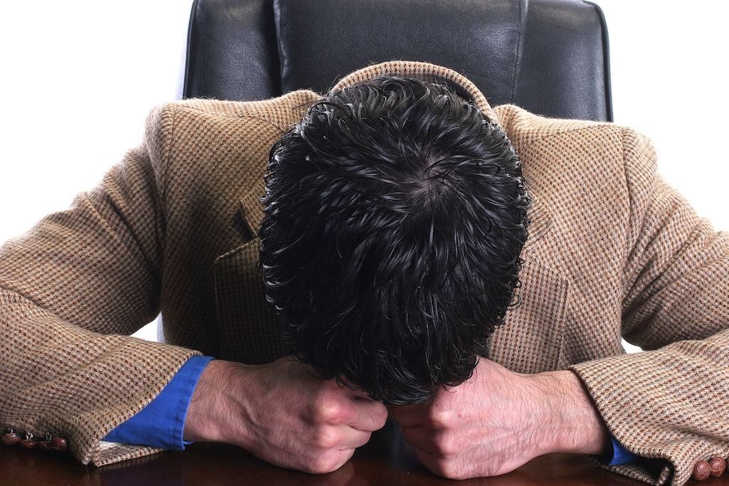 businessman in agony